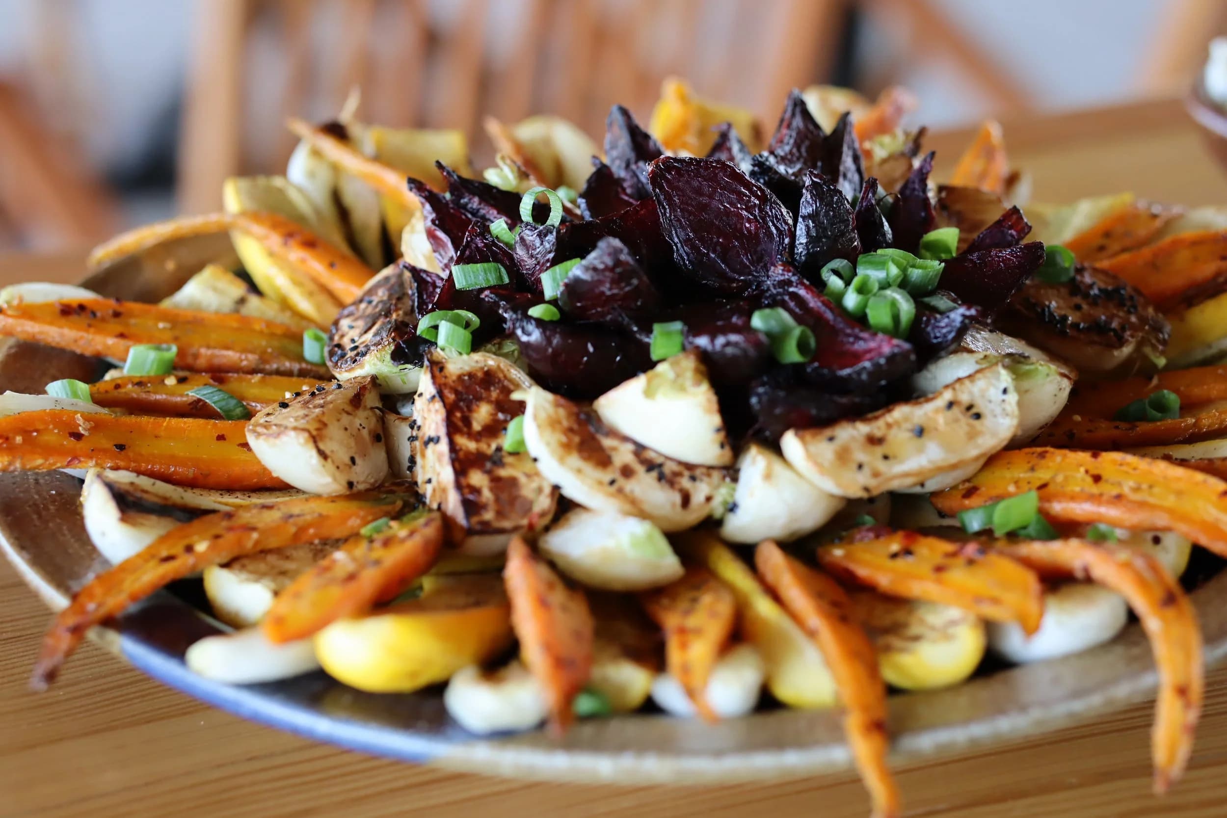 A platter of roasted carrots, turnips, and beets